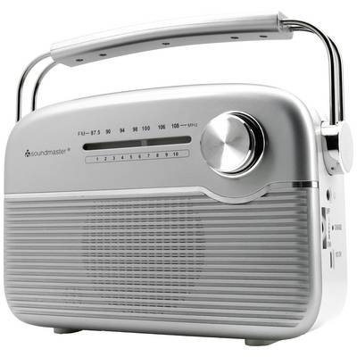 Et sølvfarvet bærbart radiosystem med FM-skala, volumenkontrol og udtrækbar antenne. Perfekt til musik på farten.