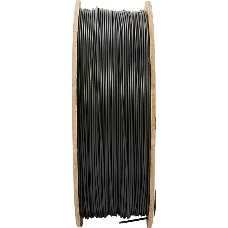 En rulle sort kabel, fast viklet på en spole, egnet til elektriske installationer eller andre formål.