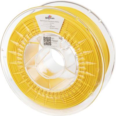 Gul filamentrulle til 3D-printer. Etiketten viser: 'Spectrum Premium PETG', printtemperatur 230-250°C. Transparent kabinet.