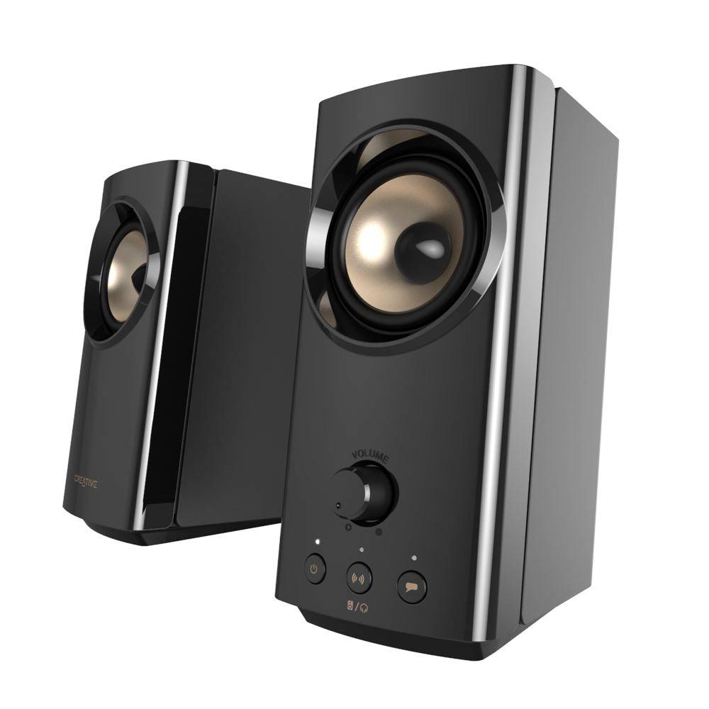 Sorte højttalere med sølvdetaljer, højre højtaler med volumenkontrol og to knapper på forsiden.
