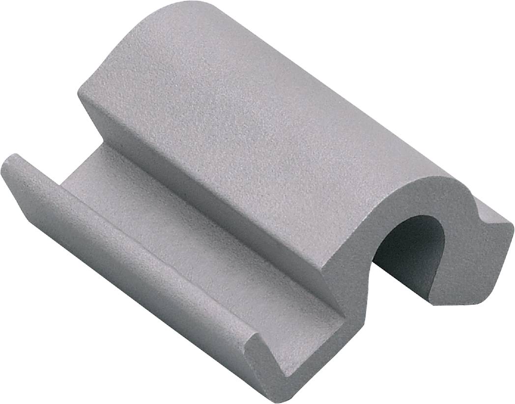 Grå, buet metalprofil med rund udskæring og flad underdel, sandsynligvis en maskindel eller konstruktionselement.