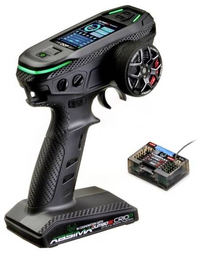 Fjernbetjening med LCD-skærm og kontrolknapper ved siden af en modtager. Egnet til styring af modelkøretøjer.