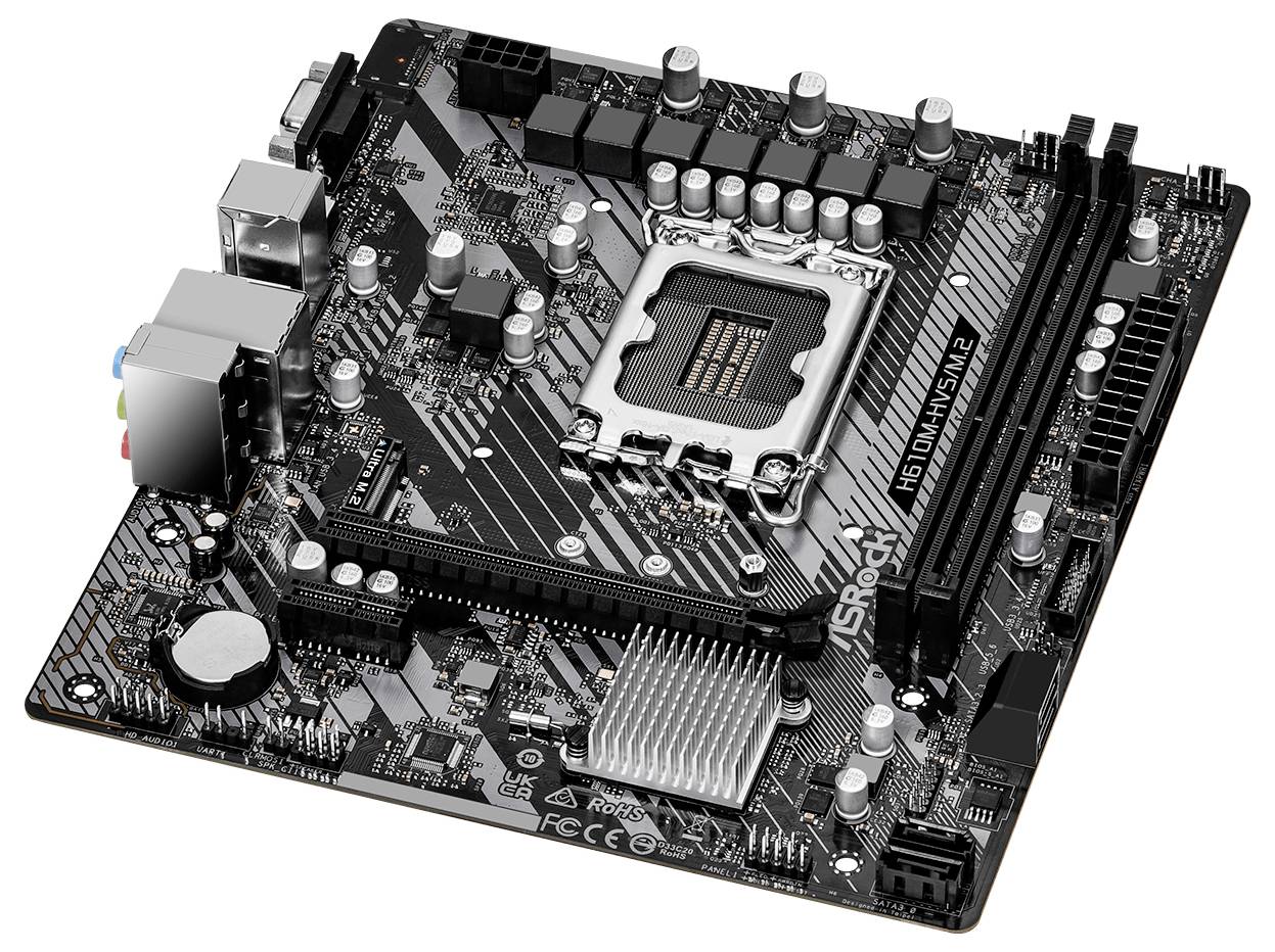 Et computer-bundkort med forskellige stik og tilslutninger, herunder RAM-pladser og CPU-soklen.