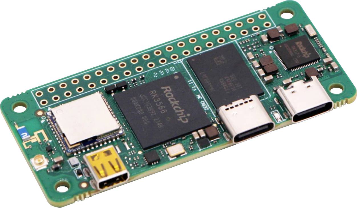 En enkeltpladsecomputer med flere chips og forbindelser på en grøn printplade, egnet til elektroniske projekter.