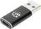 USB-adapter med sort kabinet og USB-C til USB-A stik, liggende på en hvid overflade.