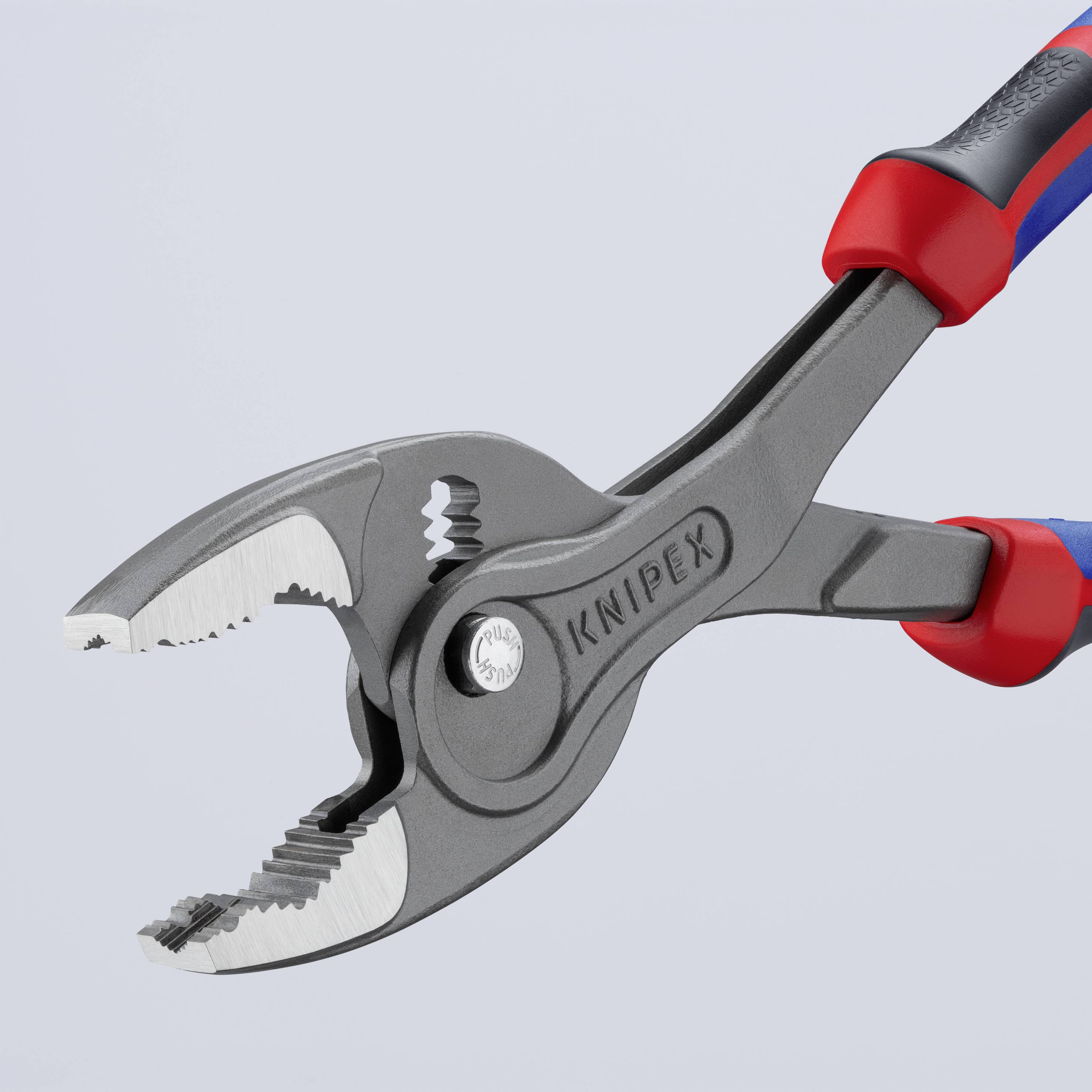 En grå, justerbar tang med rødt og blåt greb, mærket med 'Knipex'. Velegnet til forskellige greb- og fastholdelsesjob.