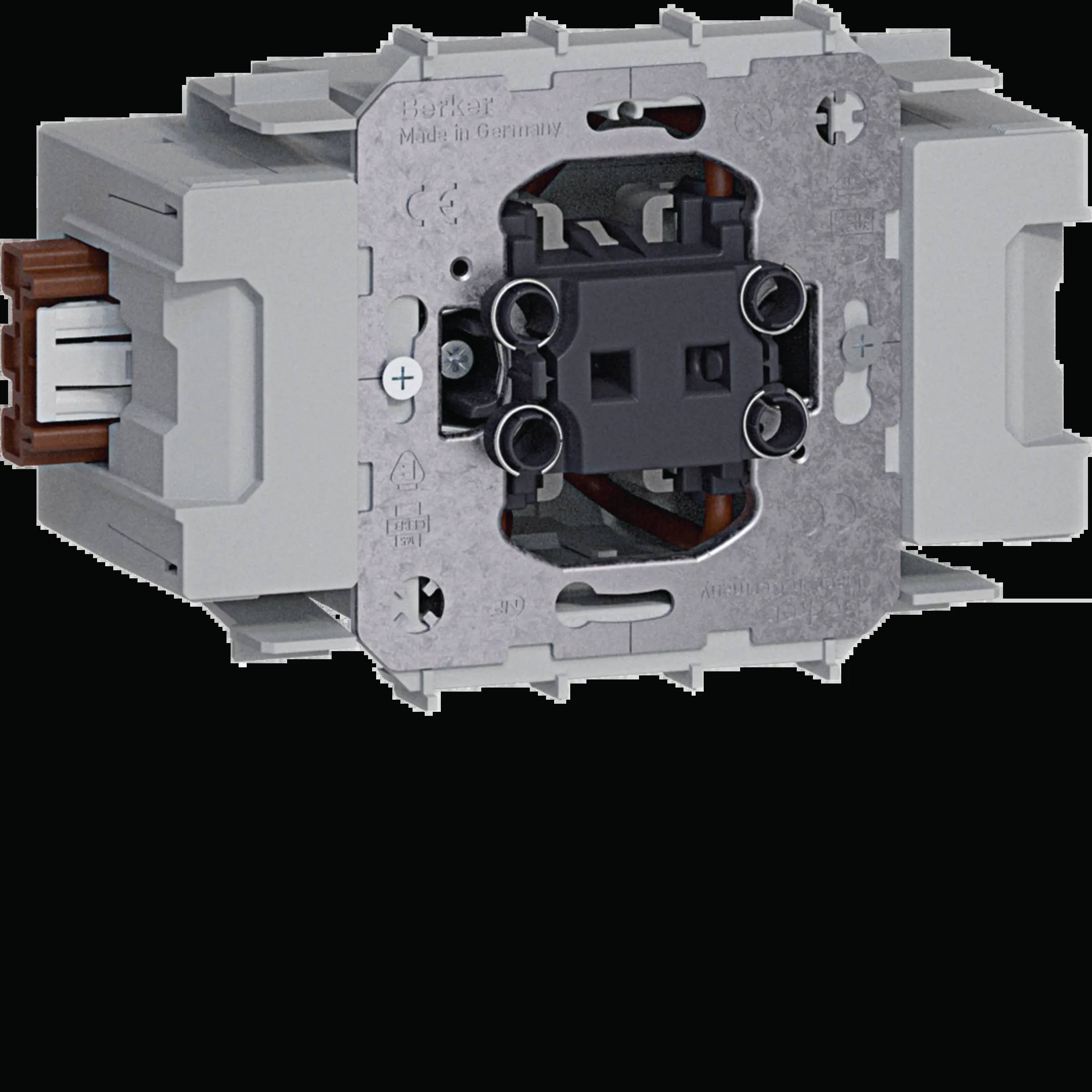 Nærbillede af en elektrisk kontakt uden afdækning, viser den indvendige mekanisme og ledningskomponenter.