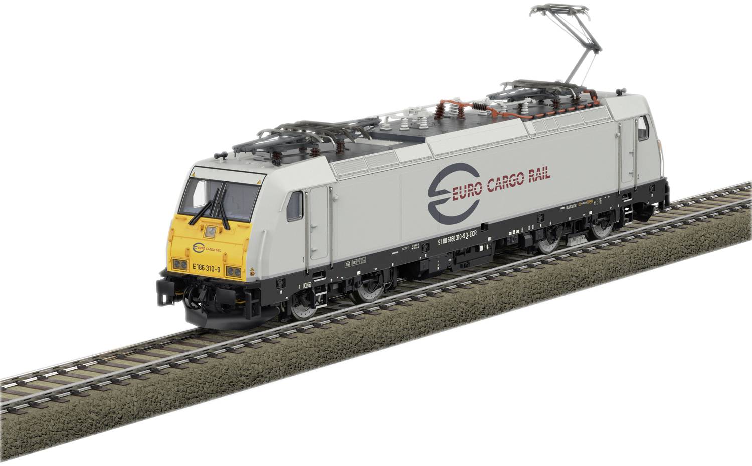 Et godstog med påskriften 'Euro Cargo Rail' kører på skinnerne. Lokomotivet har et gult frontdesign med grå karrosseri.