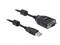 USB til seriel adapter, USB-stik til venstre, seriel RS-232-stik til højre, sort kabel med ferritekerner i begge ender.