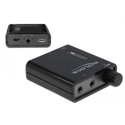 En sort D/A-konverter fra Delock med volumenkontrol og to hovedtelefonstik. Øverst til højre et detaljeret billede af stikkene.