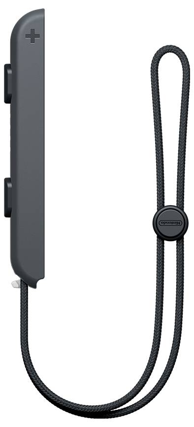 Grå elektronisk controller med håndrem i bunden, set fra siden.