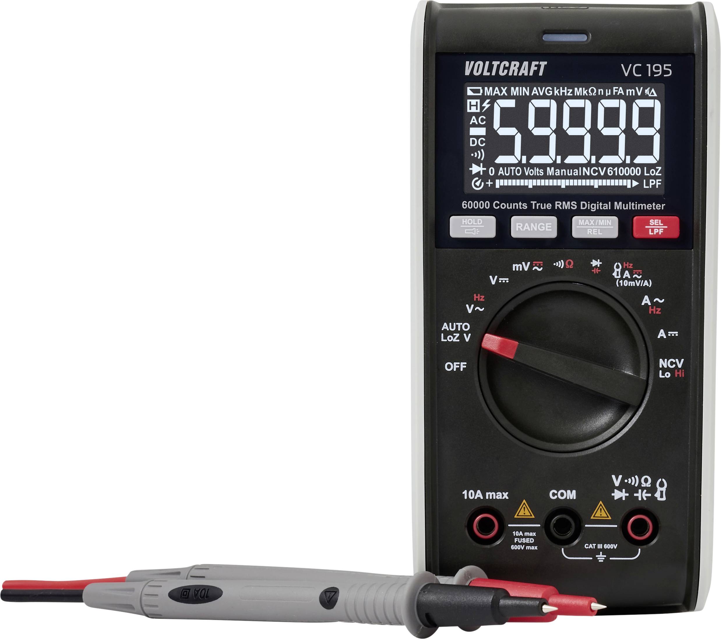Et digitalt multimeter, der viser 5,099 volt, med forskellige testindstillinger synlige. Røde og sorte testledninger er placeret foran enheden.