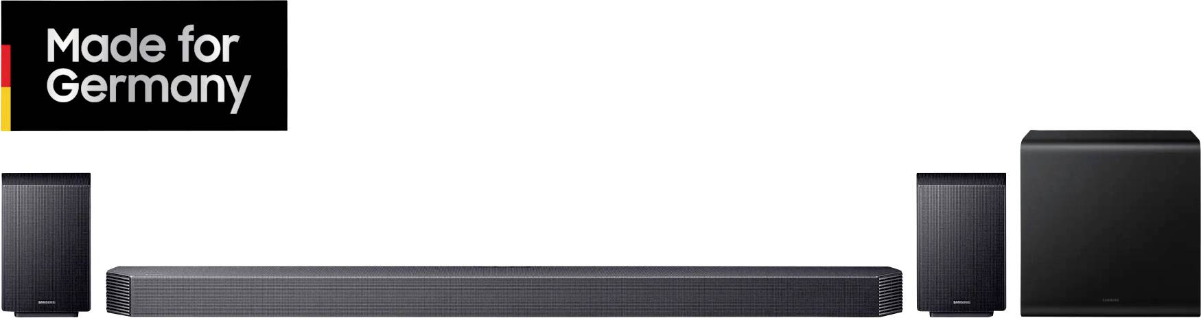 Hjemmeunderholdningssystem bestående af soundbar, subwoofer og to satellithøjttalere. Øverst til venstre sort banner 'Made for Germany'.
