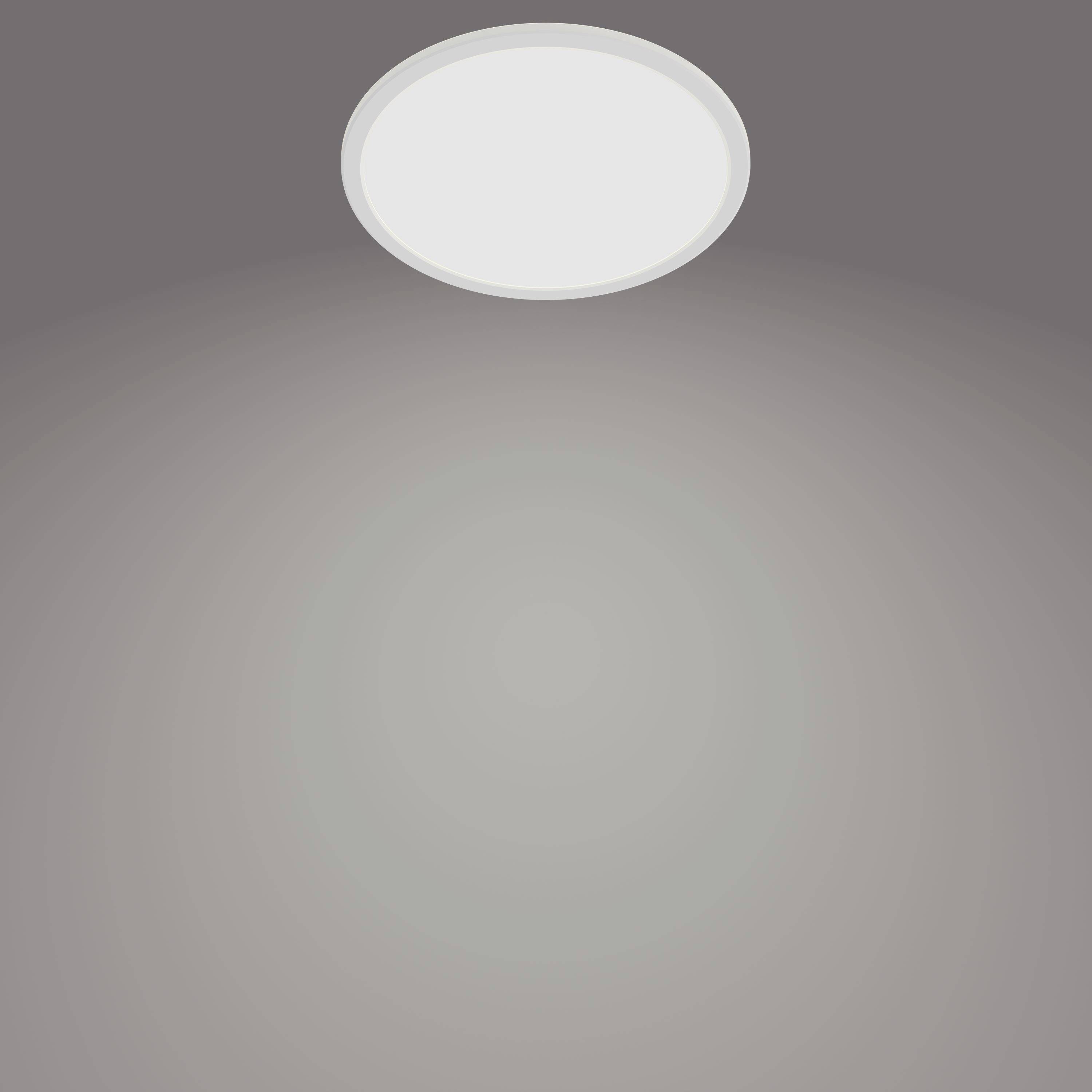 En rund loftlampe oplyser et gråt rum blødt.