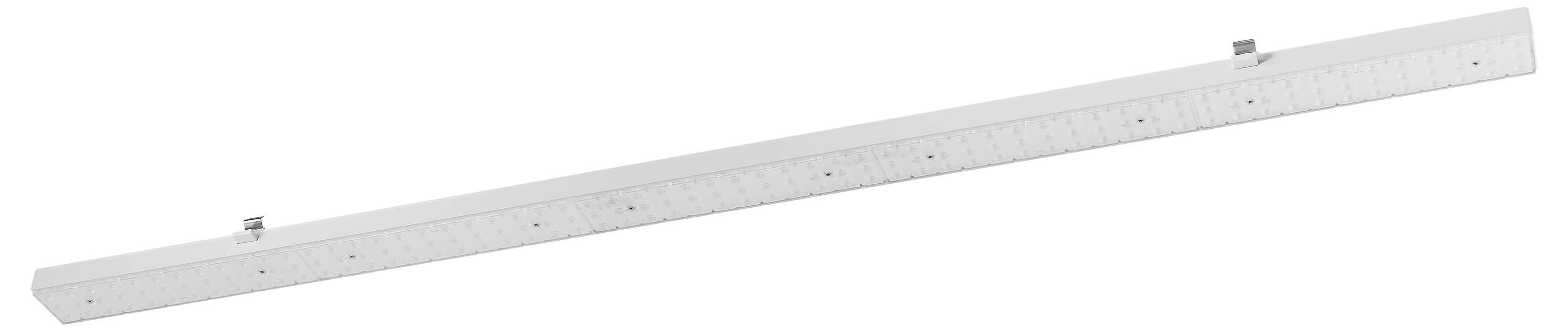 En lang, gennemsigtig plastiklineal med centimeter- og tommemarkering, fotograferet skråt fra øverst til højre ned til nederst til venstre.