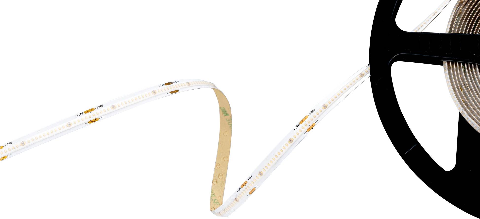 En rulle LED-stripbelysning delvist udfoldet, der viser små LED-pærer langs hele dens længde, på en hvid baggrund.