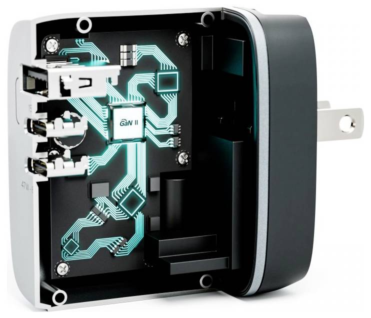 Billedet viser et tværsnit af en GaN II elektrisk adapter med belyst kredsløb, hvilket fremhæver dens kompakte og avancerede design.