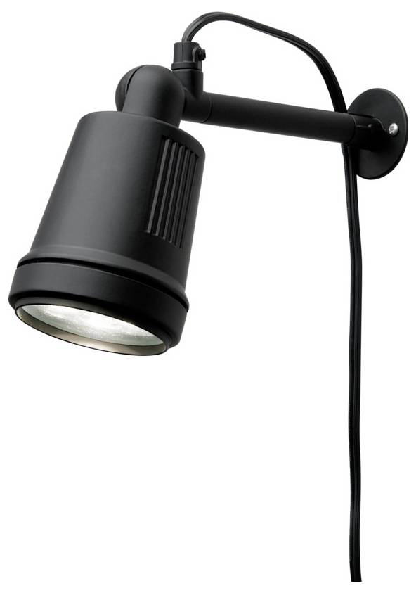 En sort vægmonteret spotlampe med et cylinderformet lampehoved vinklet nedad, fastgjort med en kort arm. En ledning hænger ned fra basen.