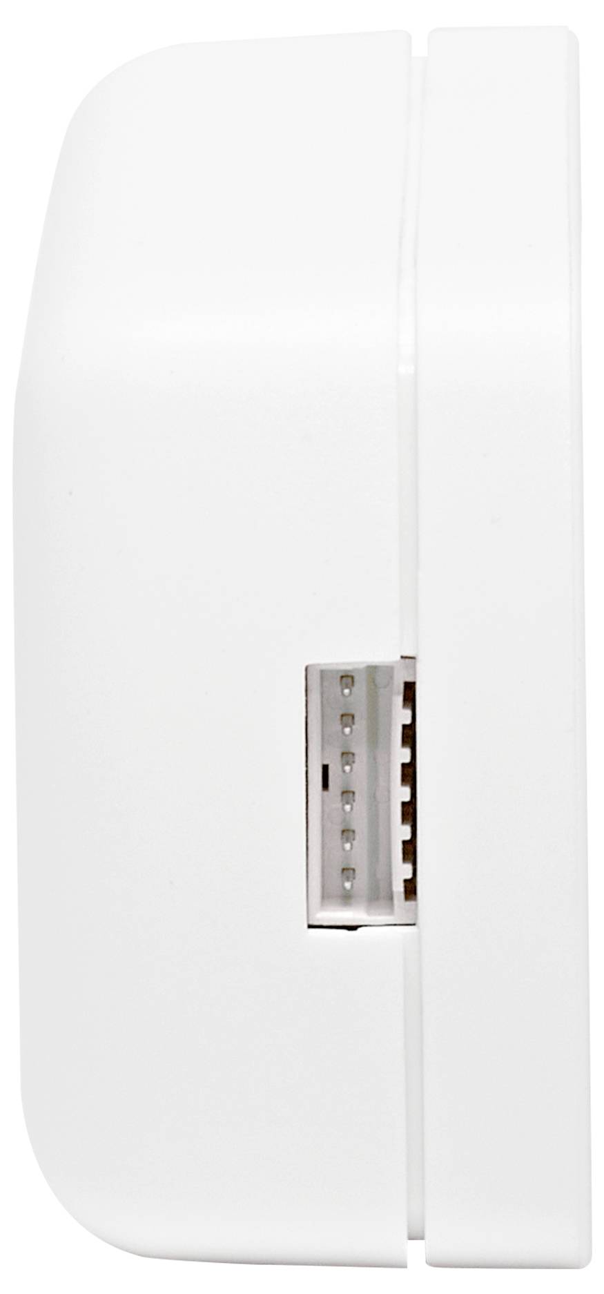 Et nærbillede set fra siden af en hvid elektronisk enhed med en synlig multi-pin stik.
