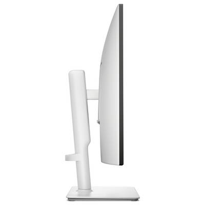 Legetøjsmodel af en pottet plante lavet af indbyrdes forbundne klodser, med grønne blade, gule blomster og en brun base.