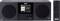 Et sort stereosystem med to højttalere og et digitalt display, der viser "DAB: Absolut Radio". En fjernbetjening er placeret til højre.