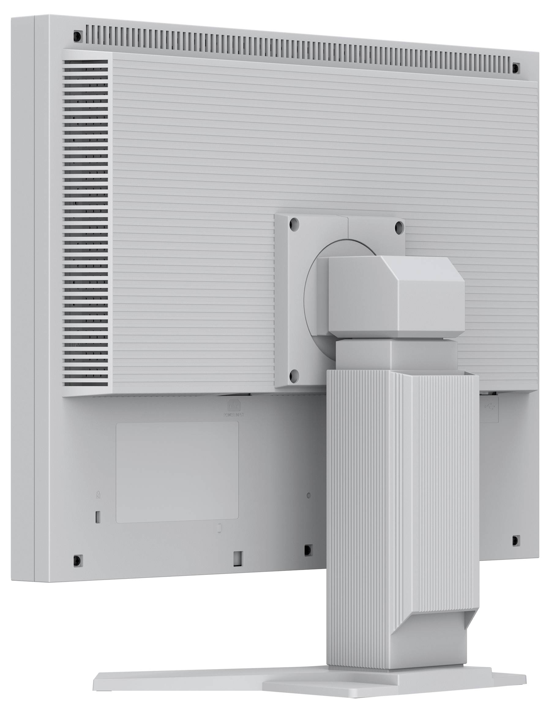 Bagsiden af en desktop-skærm med en central stander og kabelkabinet, der viser ventilationslameller og monteringspanel.
