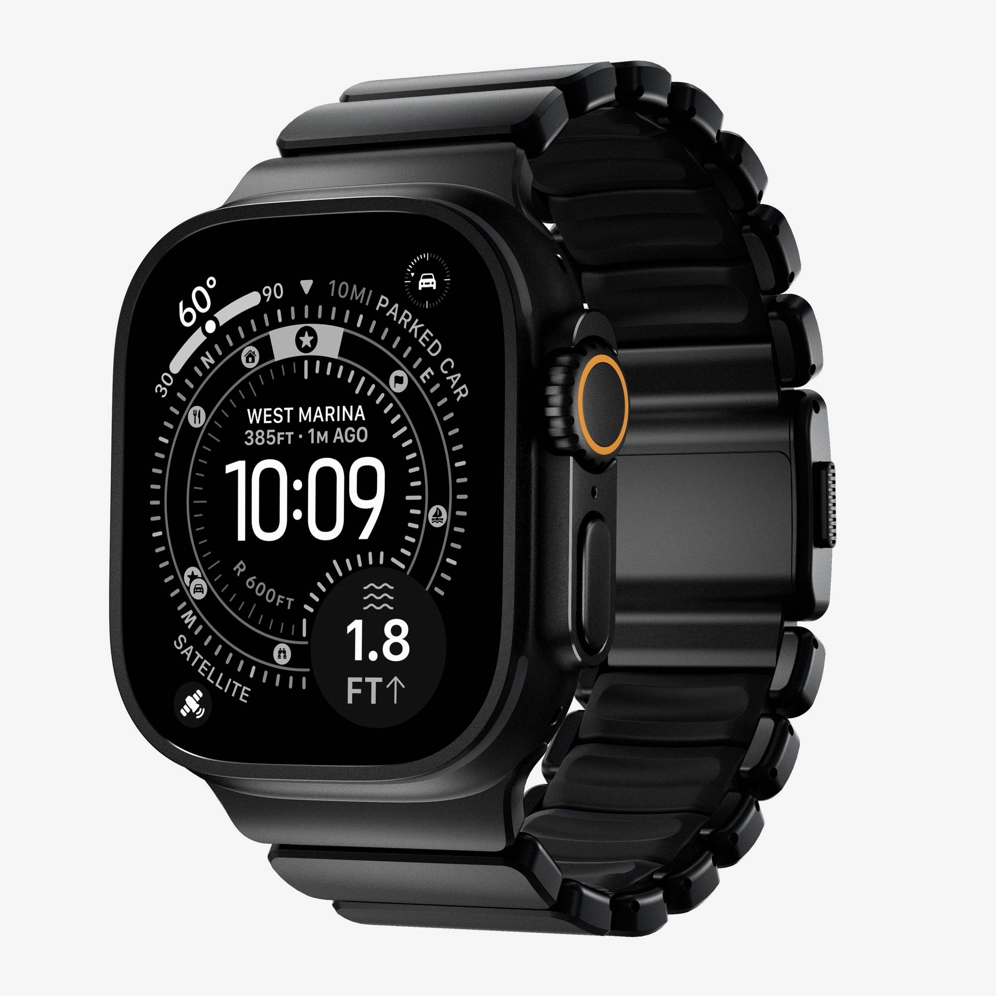 Sort smartwatch med metallisk rem, der viser et digitalt analogt urskrift, placering 'West Marina,' tidspunkt 10:09 og kompas-/navigationsindikatorer.