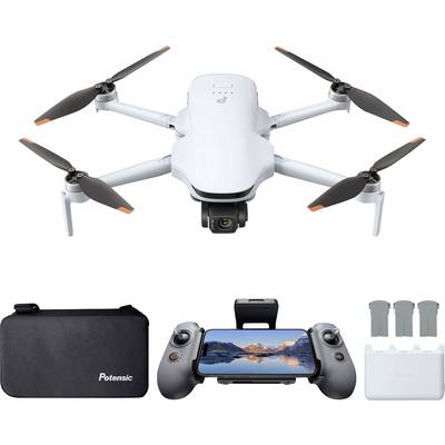 Hvid sammenklappelig kvadrokopterdronekan med kamera, fjernbetjening der holder en smartphone, transportkasse og reservebatterier/tilbehør vist på hvid baggrund.