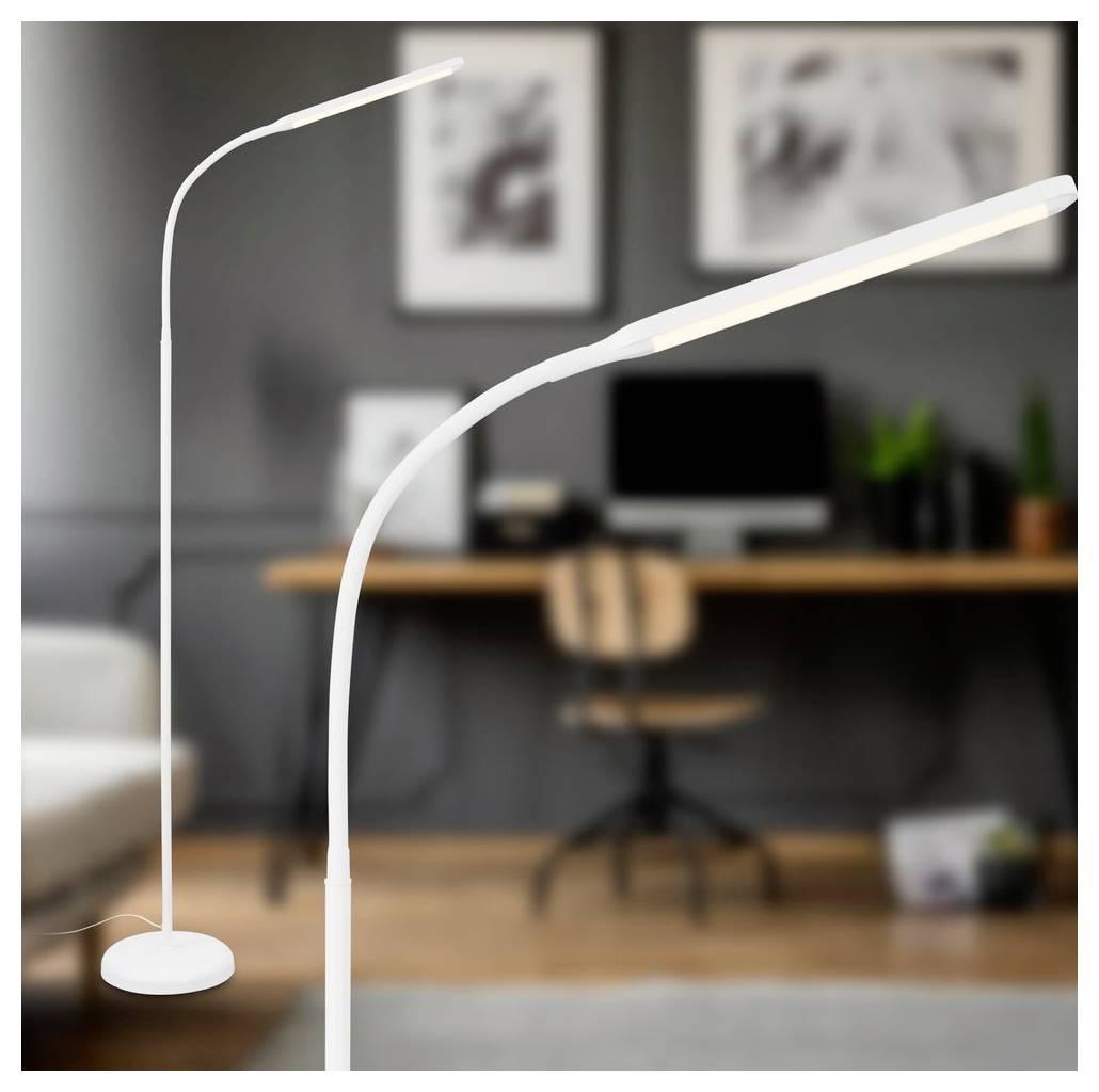 To hvide justerbare LED-skrivebordslys, et højt og et buet, vist i et uskarpt hjemmekontor med skrivebord og computer i baggrunden.
