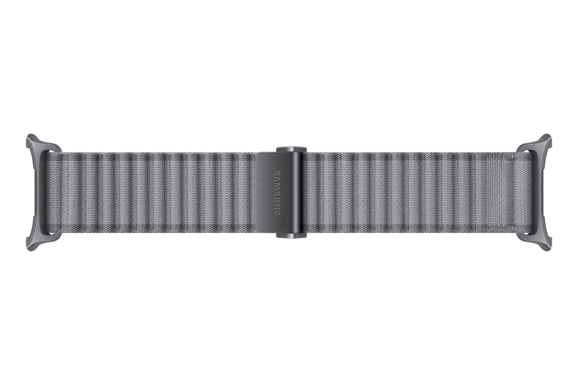 Gråt vævet Samsung-urarmband med sorte stik på hvid baggrund.