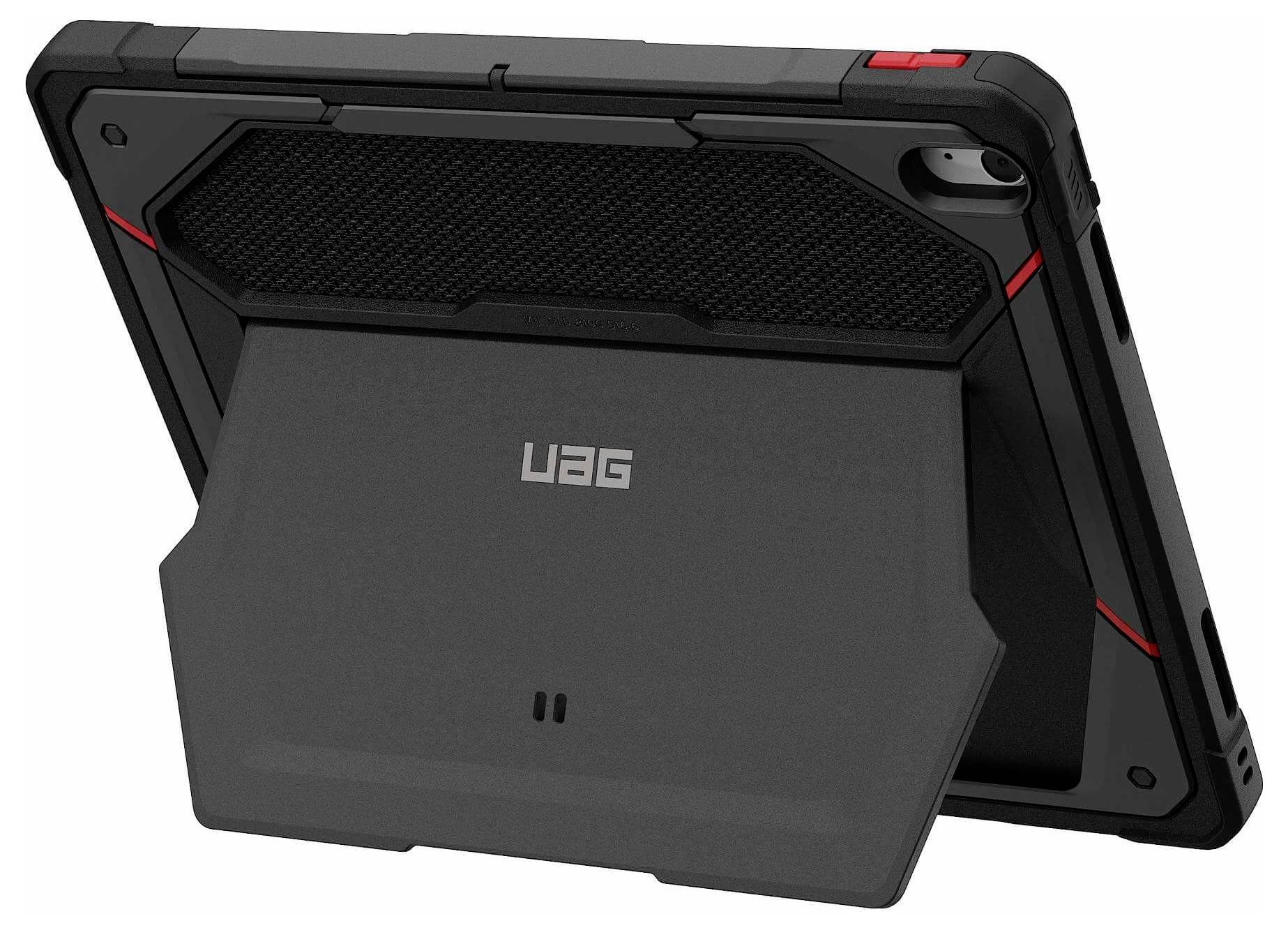 Sort robust tabletkasse med indbygget stativ, vist delvis åben og set fra bagsiden.