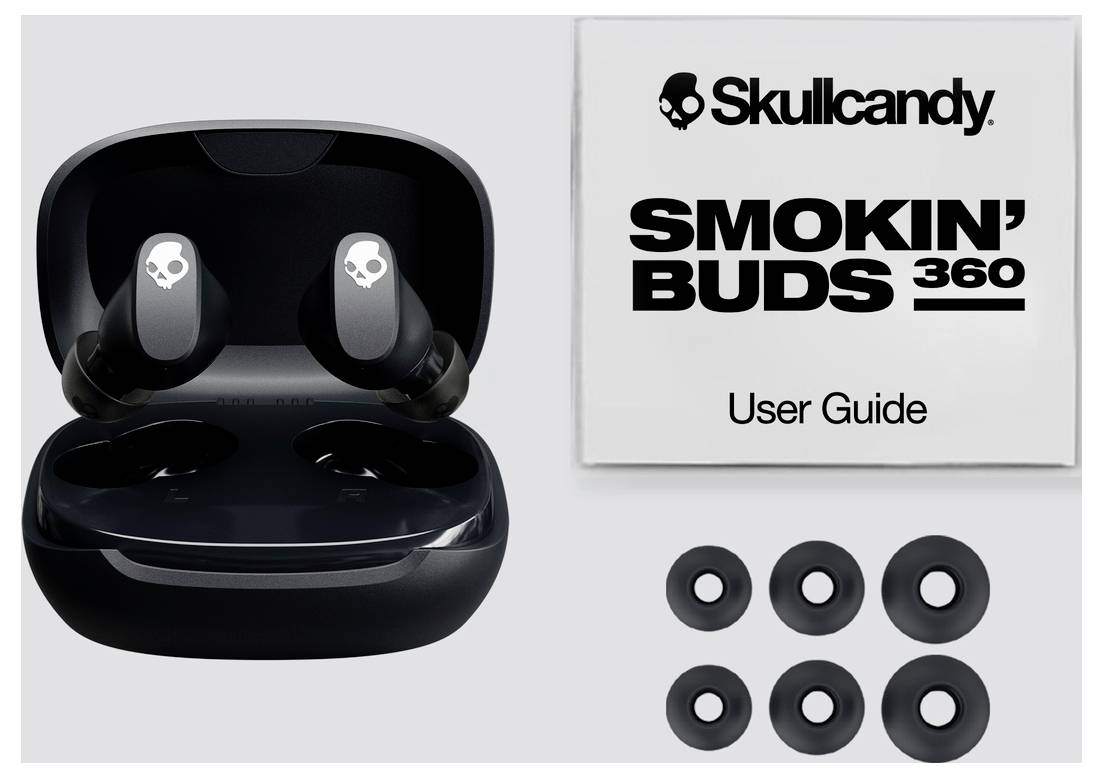 Skullcandy Smokin' Buds 360 trådløse øretelefoner i et åbent opladningsetui, med en brugervejledning og tre sæt øretips vist ved siden af dem.
