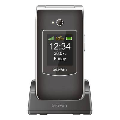 Klaphåndstel i en opladerenhed, der viser en skærm med signalstænger, 4G LTE, batteriikon, 12:34, 28.07., og fredag.