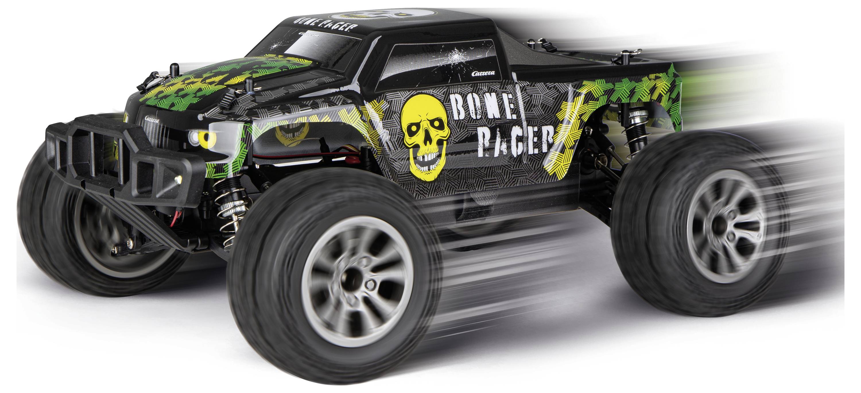 Sort terræn-monster truck med gult dødningehoved 'BONE RACER' grafik og bevægelsessudslør, vist i sidevisning på hvid baggrund.