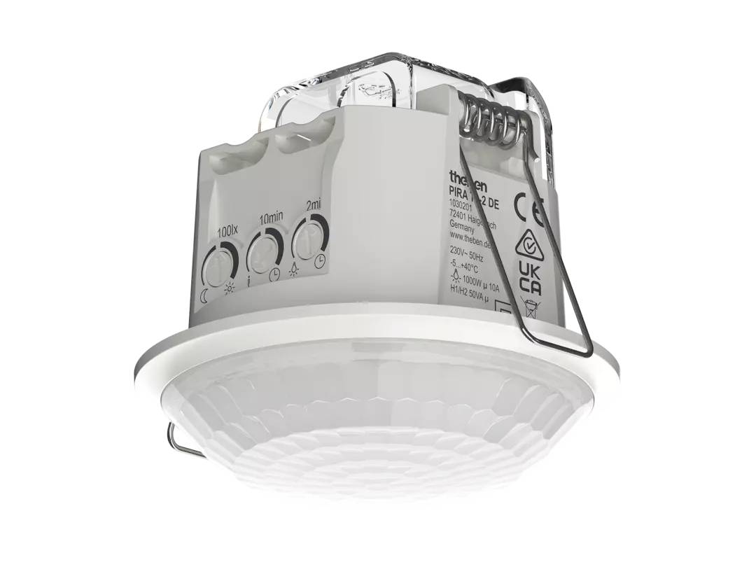 Loftmonteret PIR-bevægelsessensor med lys med en mat rund diffusor og justerbare kontroller for tid, lux og rækkevidde synligt på toppen.