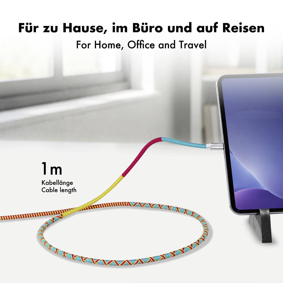 Reklamebillede af et 1 m kabel forbundet til en bærbar computer, mærket 'Til hjemmet, kontoret og rejser' og 'Kabellængde/Kabellængde'.