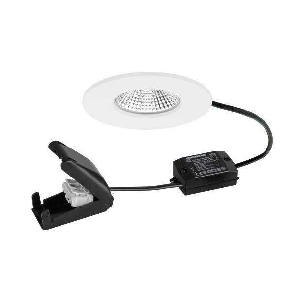 LED indbygningsspot-kit med hvidt trim, sort driverbox og fjederklemme til loftmontage.