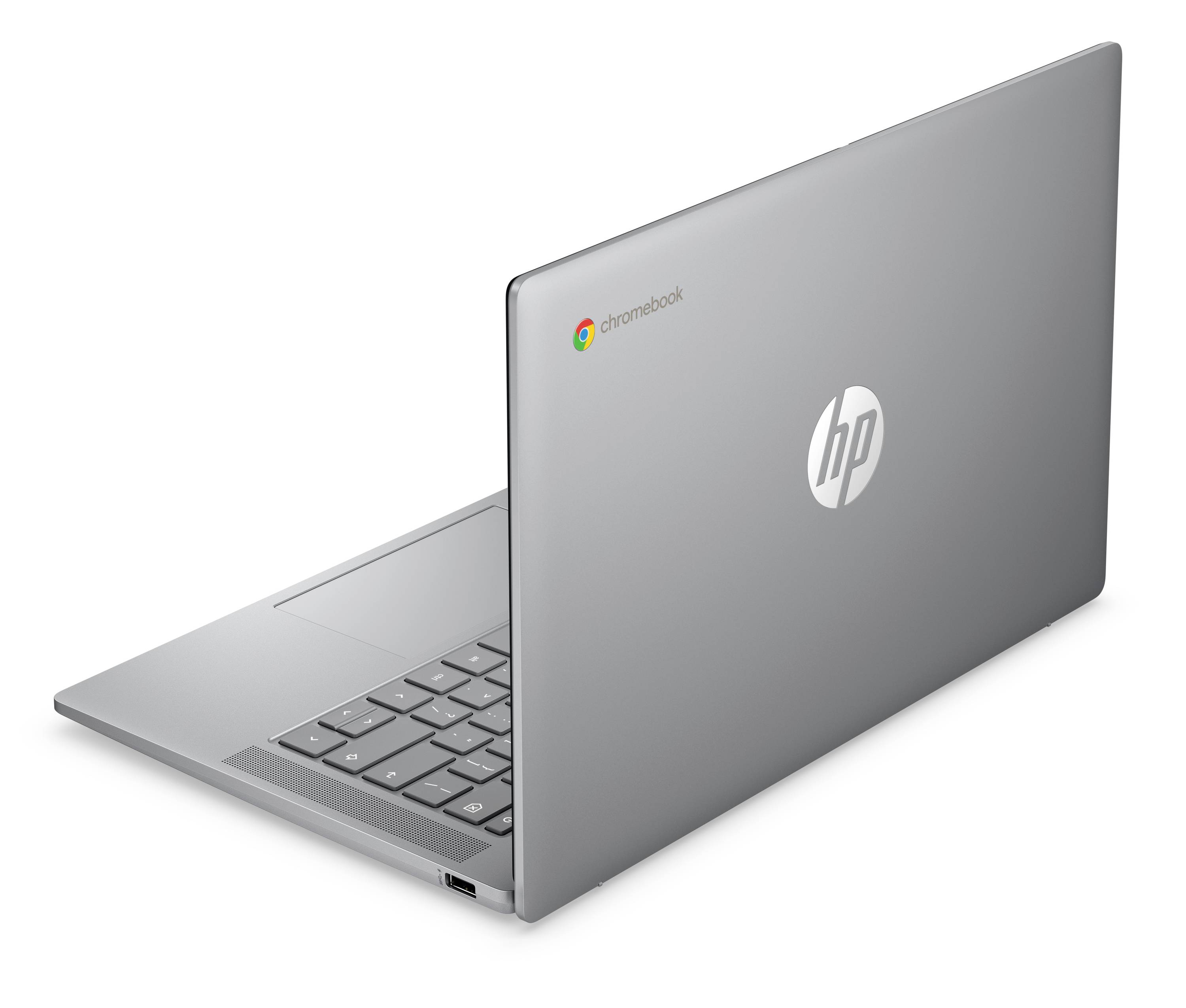 Sølv HP Chromebook-bærbar computer vist delvist åben med synligt tastatur og Chrome-logo på låget.
