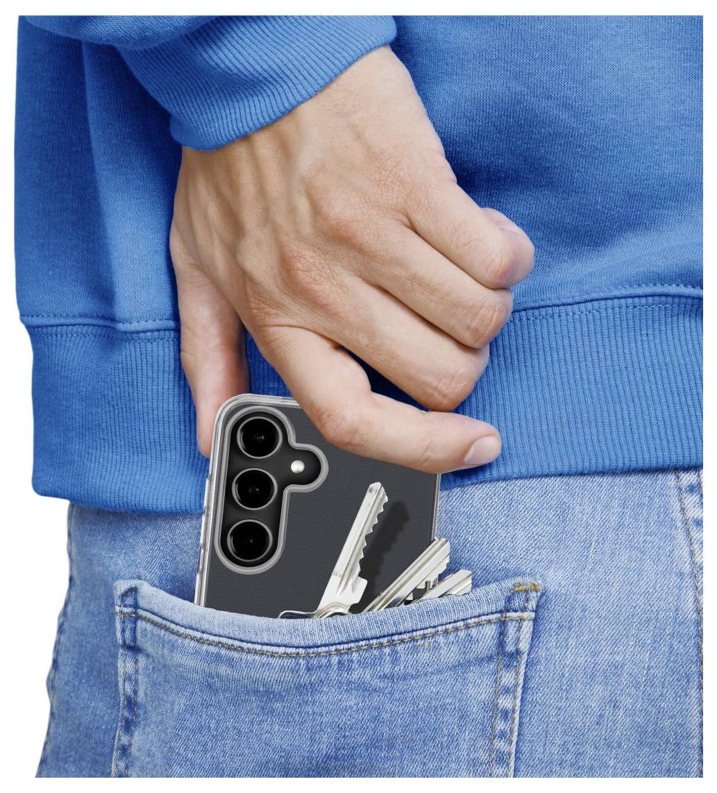 Hand gemmer en smartphone og nøgler i en jeans baglomme, hvilket antyder skjulte ejendele eller muligt tyveri.