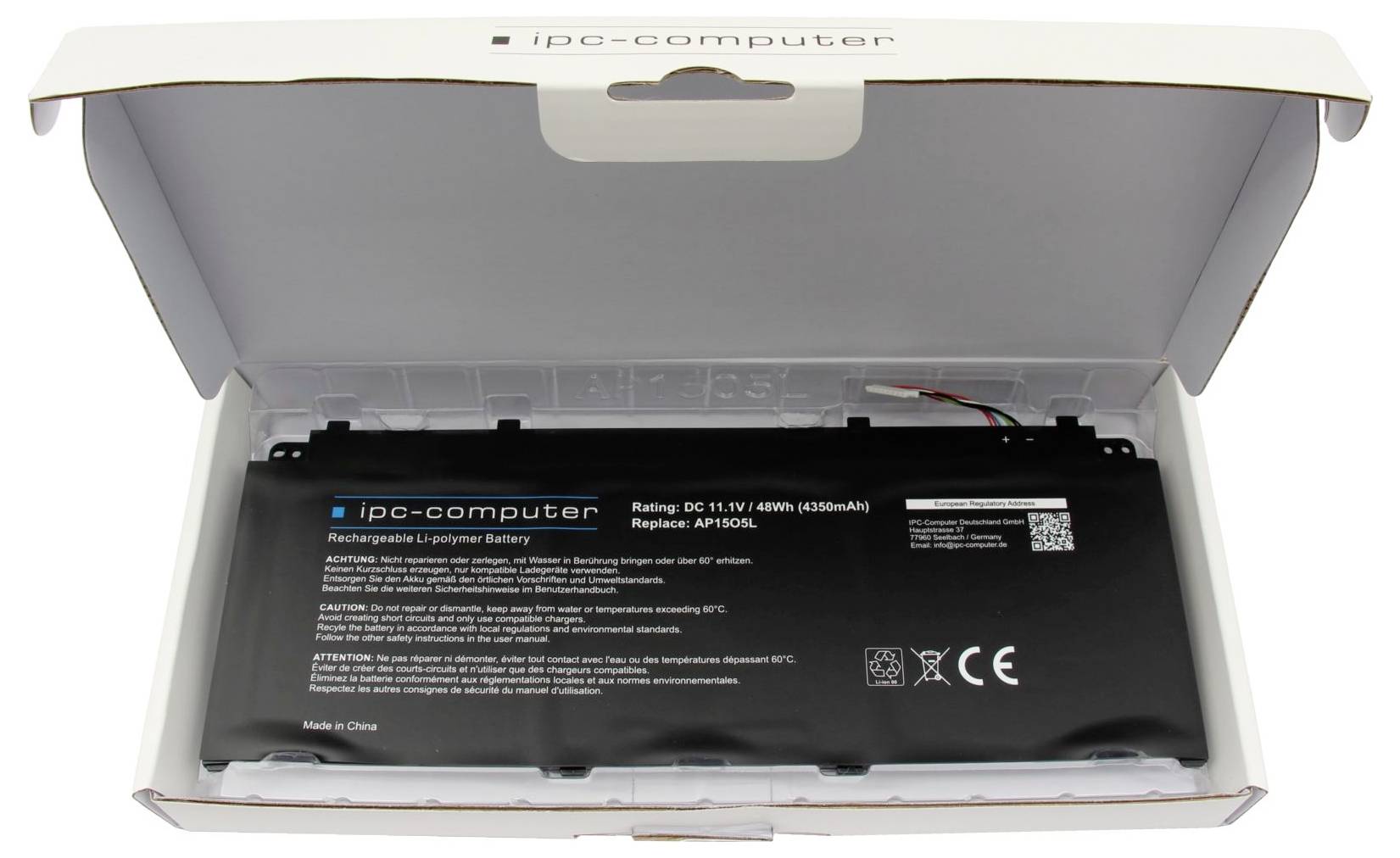 Åbn boks med en IPC-computer genopladeligt Li-ion batteri pakket i beskyttende papkasse.
