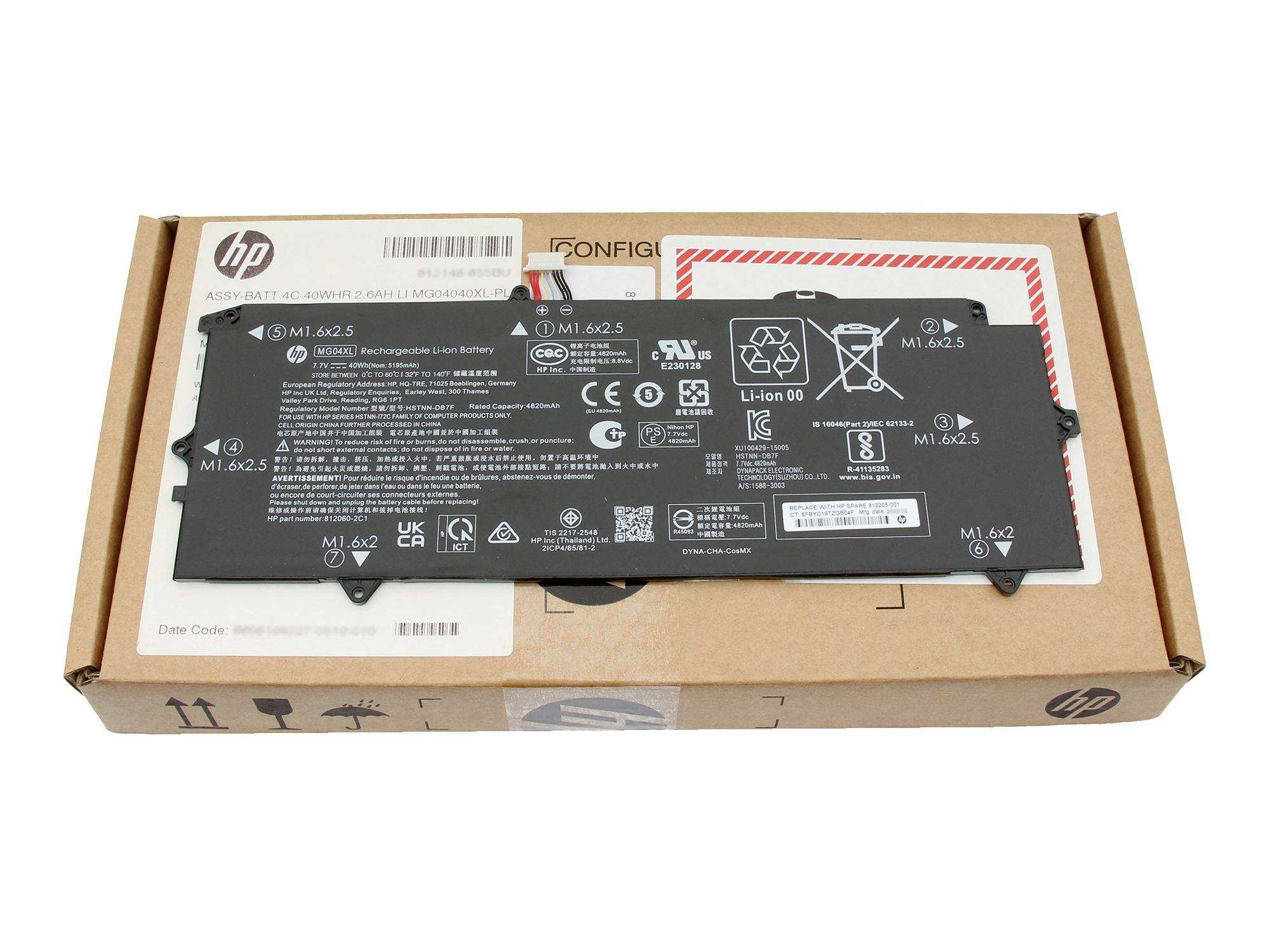 HP-batteripakke hviler på toppen af en HP-forsendelseskasse, vist fra oven på en hvid baggrund.