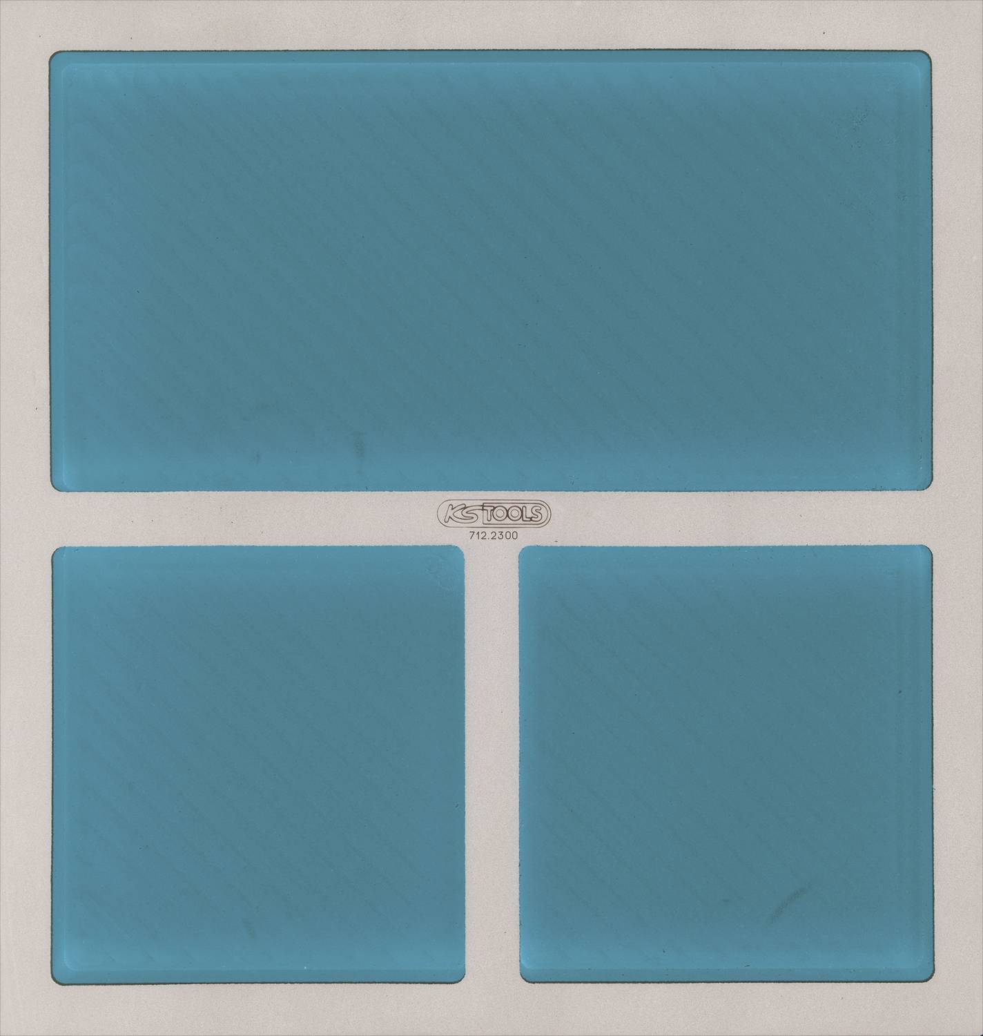 Teal silikone bageplade med et stort topprektangel og to mindre bundprektangler på en beige baggrund.