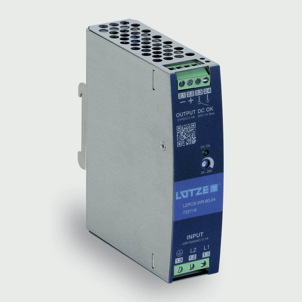 Industrielt DIN-skinne strømforsyningsmodul med metalkabinet og blå frontpanel, der viser mærker for input- og outputterminals.