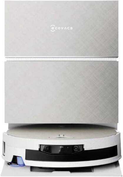 Hvidt Ecovacs robotstøvsuger parket under en matchende ladestation, med dets forreste sensorer og sidetaksel synlige.