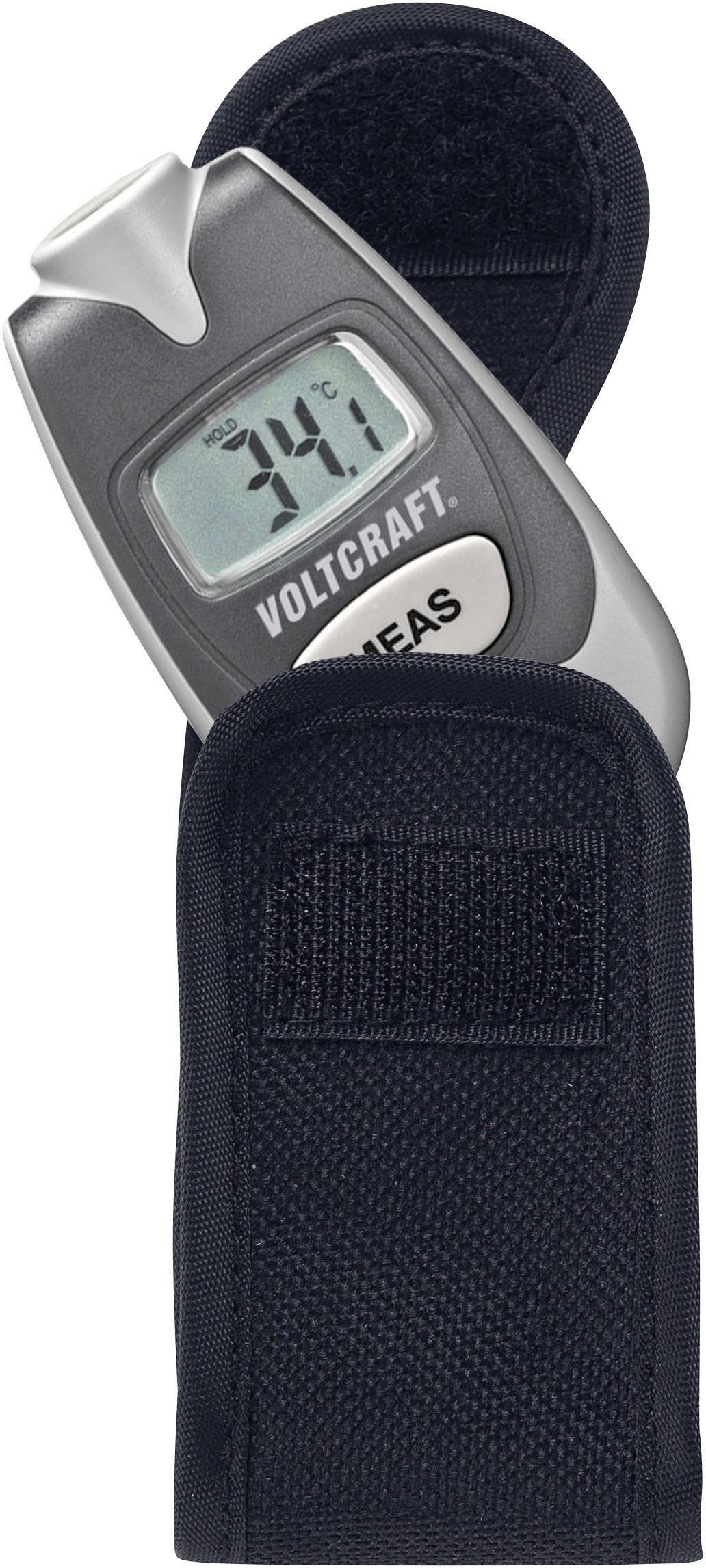Digitalt infrarødt termometer viser 34,1 grader celsius, taske åbnet. Enhed fra Voltcraft, sølvfarvet kabinet.