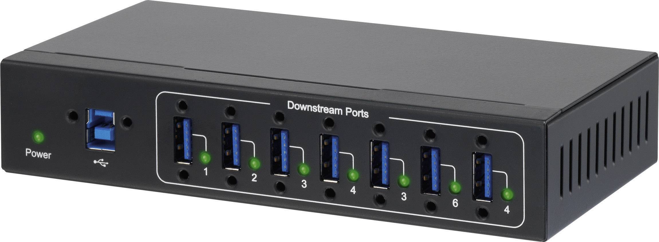 En USB-hub med syv blå USB 3.0-porte på forsiden, grønne LED-indikatorer og en strømforsyningsknap til venstre.