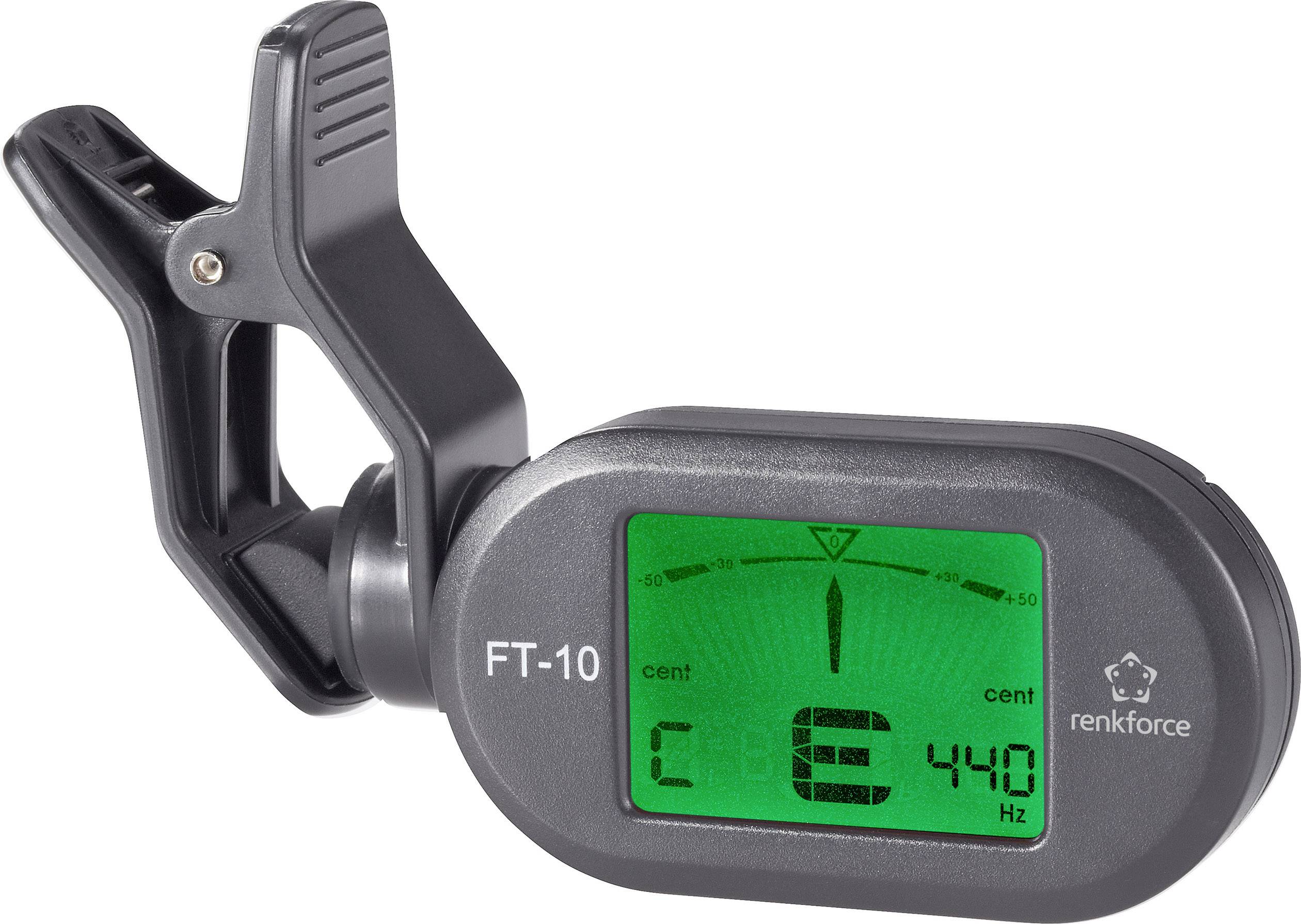 Et clip-on stemmeinstrument med digitalt display viser et instruments stemning. Det viser tonen 'E' og frekvensen 440 Hz.