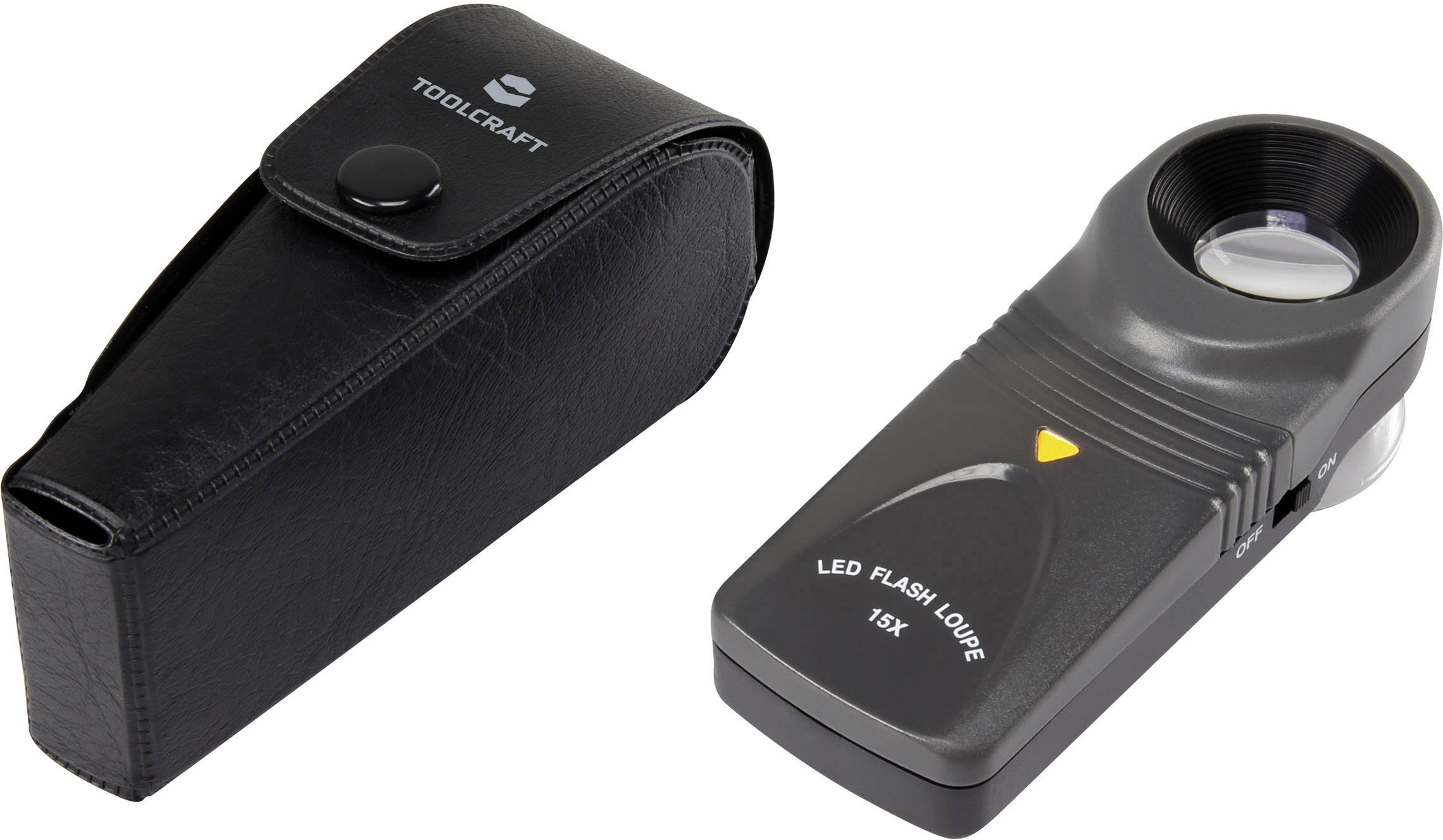 Elektronisk LED-lup med 15x forstørrelse, ved siden af en sort etui.