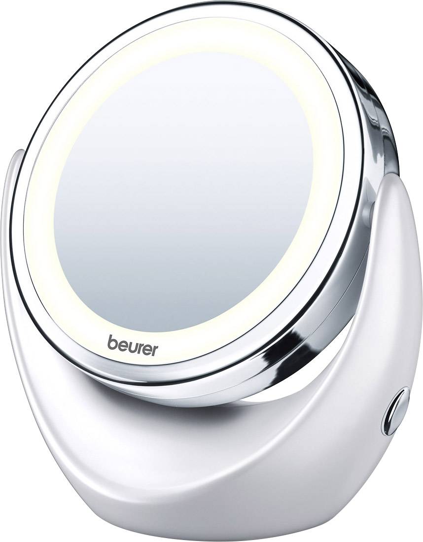 En rund kosmetikspejl med LED-belysning og forkromet ramme på en stabil hvid fod, mærke Beurer.