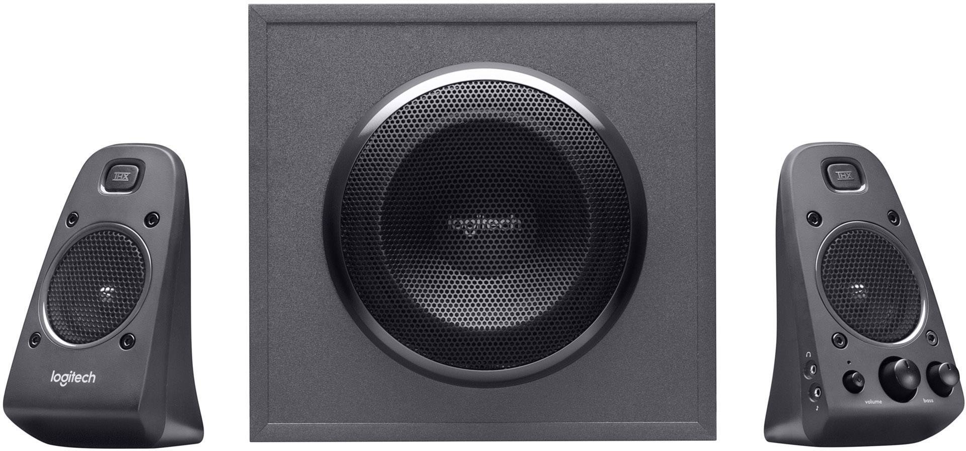 Højttalersæt med en subwoofer i midten og to satellithøjttalere placeret henholdsvis til venstre og højre, alle i sort farve.